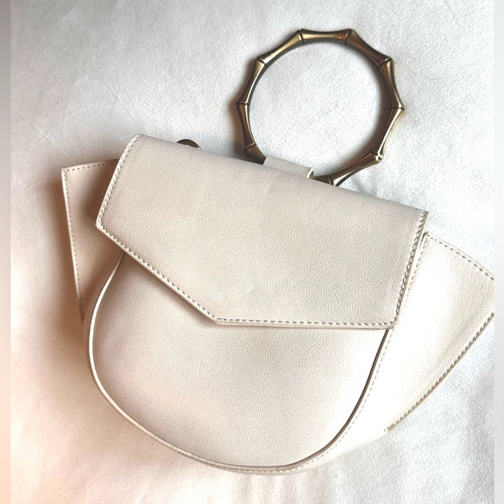 Elegant Cream Handbag with Gold Handle